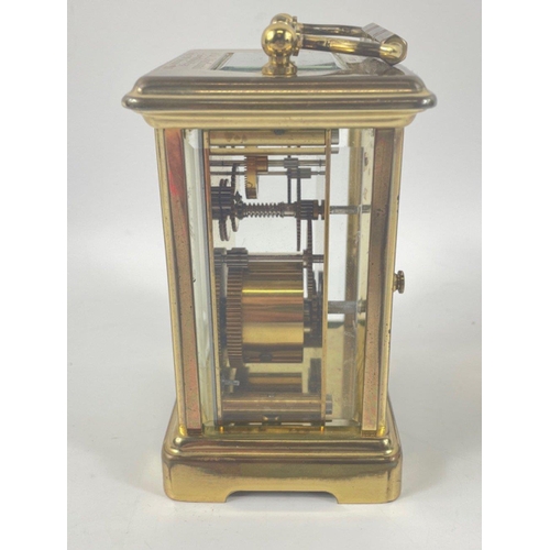 60 - A LONDON CLOCK CO brass travelling clock presented to the Officers Mess of 4 Armd Div. Tpt. Regt RCT... 