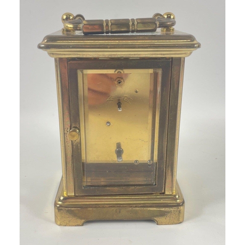 60 - A LONDON CLOCK CO brass travelling clock presented to the Officers Mess of 4 Armd Div. Tpt. Regt RCT... 