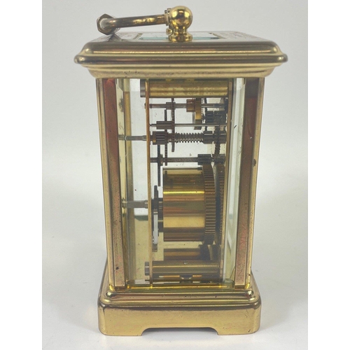 60 - A LONDON CLOCK CO brass travelling clock presented to the Officers Mess of 4 Armd Div. Tpt. Regt RCT... 