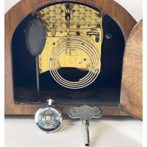 61 - Napoleon style wooden mantle clock with GARRARD movement, key and pendulum. Marked on inside with 86... 