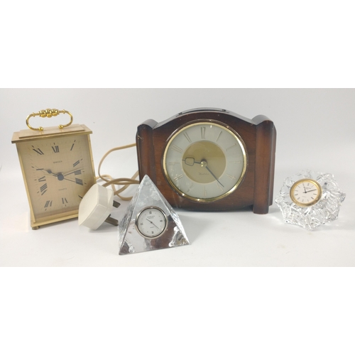 65 - Collection of clocks to include a WATERFORD CRYSTAL clock standing 8cm high, an EDINBURGH CRYSTAL py... 