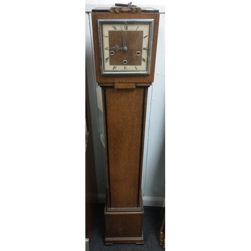 66 - Granddaughter clock by Mark Hutchings, Winchester in the Art Deco style with square dial and Roman n... 