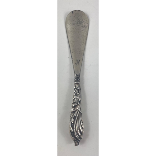 69 - A cased silver hallmarked, Birmingham 1876, Victorian button-hook and shoe spoon, gross weight 76g#7... 