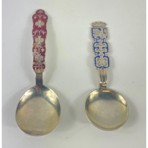 70 - Two NORWEGIAN enamelled silver spoons, the first, red-handled, by J TOSTRUP, the second, blue-handle... 