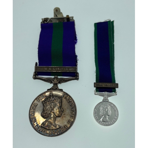 94 - A British Service medal with ribbon for MALAYA complete with its original presentation display case ... 