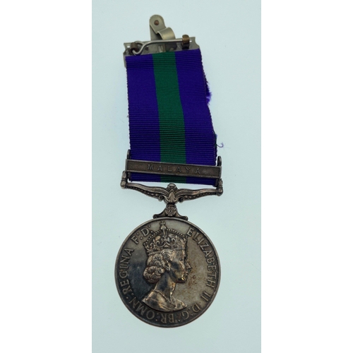 94 - A British Service medal with ribbon for MALAYA complete with its original presentation display case ... 