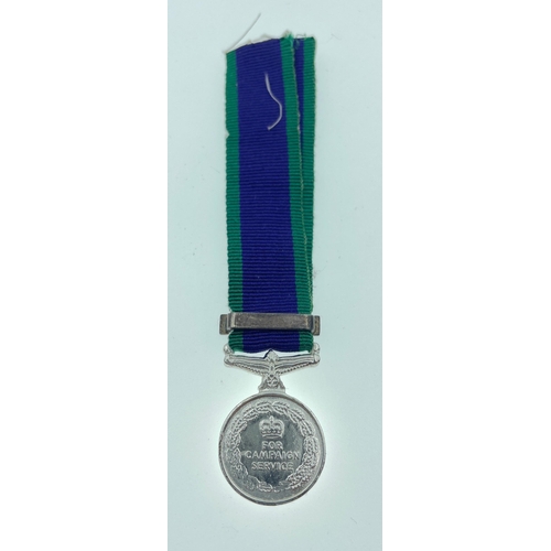 94 - A British Service medal with ribbon for MALAYA complete with its original presentation display case ... 