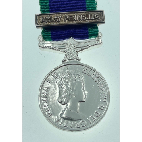 94 - A British Service medal with ribbon for MALAYA complete with its original presentation display case ... 