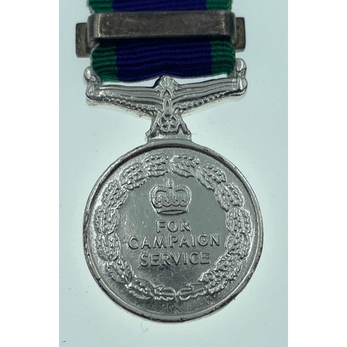 94 - A British Service medal with ribbon for MALAYA complete with its original presentation display case ... 