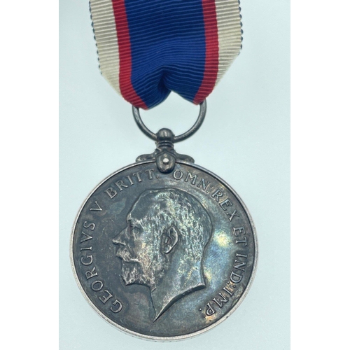 96 - A MEDAL GROUPING belonging to Signaller Smith, to include The ROYAL NAVAL RESERVE LONG SERVICE GOOD ... 