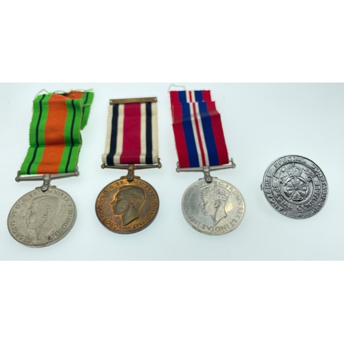 97 - A grouping of medals awarded to Charles Dobbie of the Lancashire Special Constabulary to include the... 