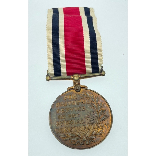 97 - A grouping of medals awarded to Charles Dobbie of the Lancashire Special Constabulary to include the... 