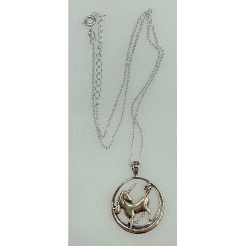 13 - A HAMILTON & YOUNG silver unicorn pendant (3cm long) and chain (46cm long), gross weight 3.7gms#14... 