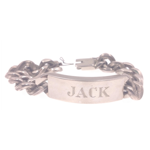 16 - A chunky man's identity bracelet inscribed 'Jack' labelled NAPIER STERLING Pat. Pend., with safety c... 