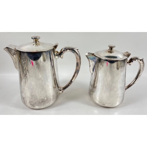 88 - From ARTHUR PRICE - a white metal coffee pot, hot water pot and sugar bowl plus a 7oz milk jug from ... 