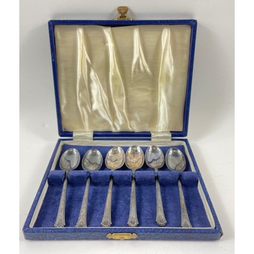 94 - A boxed set of Silver plate teaspoons (rd no 857638) with three further silver plate spoons and an E... 