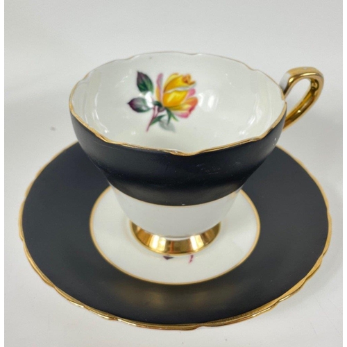 100 - A part BLACK ROSES tea service from HM SUTHERLAND to comprise 5 cups, 6 saucers and 6 side plates#12... 