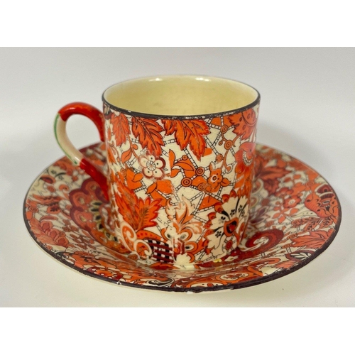 102 - A part coffee set in autumnal shades of red and orange, comprising 6 demi-tasse cups and saucers, 1 ... 