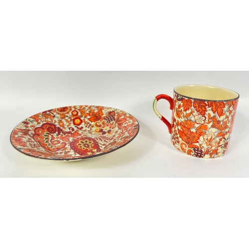 102 - A part coffee set in autumnal shades of red and orange, comprising 6 demi-tasse cups and saucers, 1 ... 