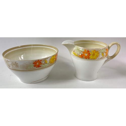 103 - A vintage ART DECO SHELLEY part tea service, pattern no 12496 with orange and yellow dahlias, compri... 