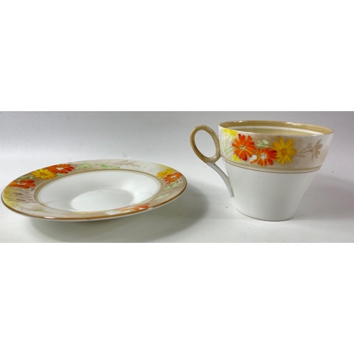 103 - A vintage ART DECO SHELLEY part tea service, pattern no 12496 with orange and yellow dahlias, compri... 