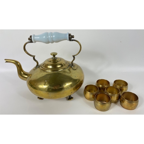 110 - A set of six brass napkin rings plus a vintage brass kettle approx 22cm high#136