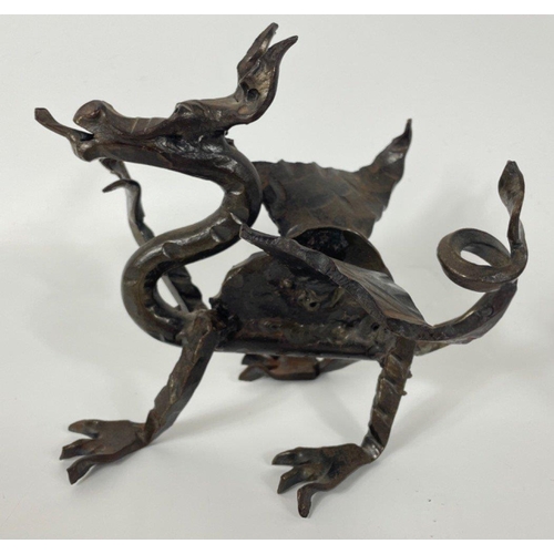 141 - A hand-made bronze dragon approx 17cm length and 14cm high#168