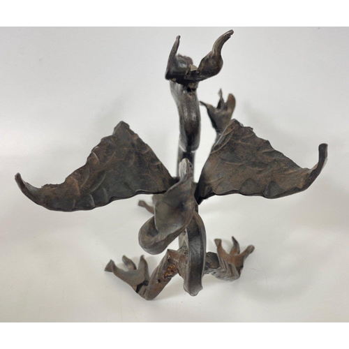 141 - A hand-made bronze dragon approx 17cm length and 14cm high#168