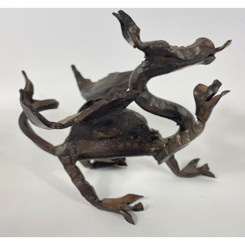 141 - A hand-made bronze dragon approx 17cm length and 14cm high#168