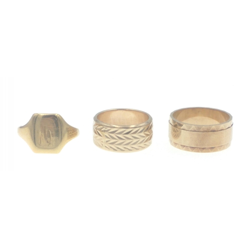 15 - An 18ct stamped small signet ring size K weight  3.2g approx, Also a 375 stamped yellow gold ring si... 