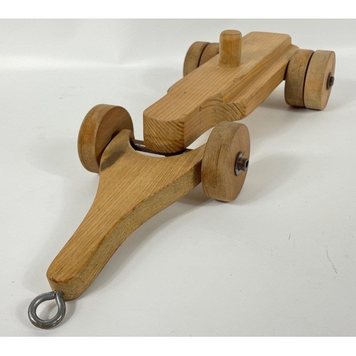 156 - A real treat for lovers of wooden hand-crafted items - a pull along vintage car (22x18cm), a tractor... 