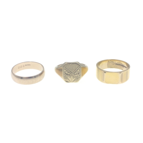 16 - A group of three 375 stamped yellow gold rings, a wedding band size W weight 5.10g approx, alsoA lov... 