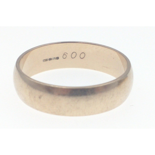 16 - A group of three 375 stamped yellow gold rings, a wedding band size W weight 5.10g approx, alsoA lov... 