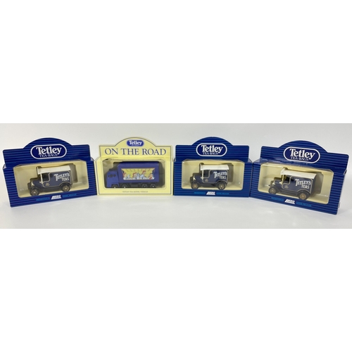 165 - A small collection of model cars to include 3 TETLEY TEA cars and one delivery lorry plus a MAISTO -... 