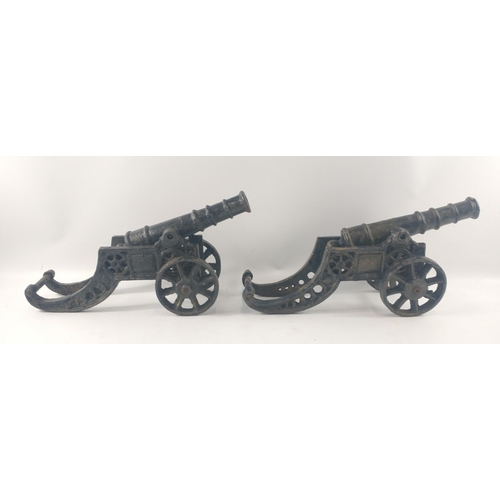 167 - A pair of doorstep heavy decorative canons#195