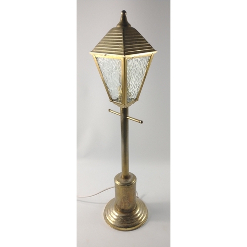 267 - A vintage brass lamp with a street lamp shade stands approx 70cm tall#320