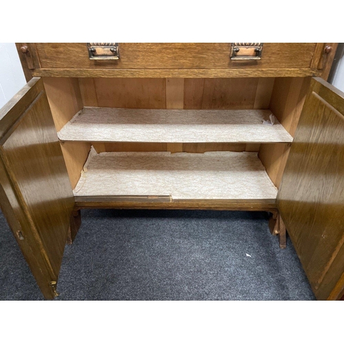 277A - A circa 1930's oak antique library and fitted bureau cabinet, with two glazed doors and four shelves... 