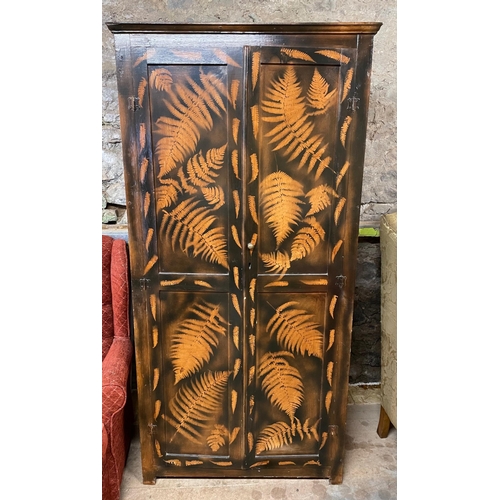 278 - A vintage two Door wardrobe with external fern design - height 6ft x 18â depth approx#332