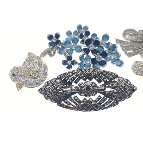 30D - A quantity of BLING vintage jewellery, brooches and earrings to include a very old silver stamped br... 