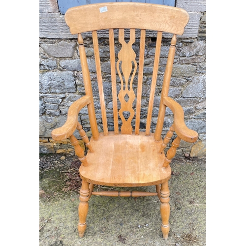 312 - A large open arm Windsor Fiddle-back beech farmhouse chair dimensions height 115cm x width 45cm x de... 