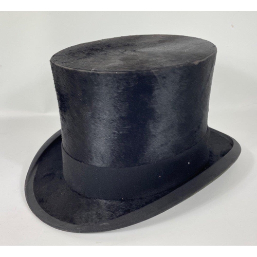 345 - Sophistication guaranteed with these topping toppers - a top hat from CHRISTYS' of LONDON (approx 6 ... 