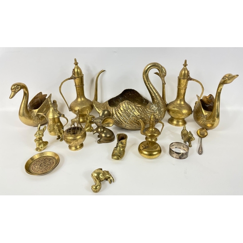 356 - A collection of brassware to include various Middle Eastern coffee pots and different sized swans#42... 