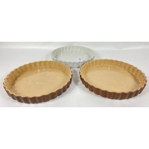 370 - Three flan dishes - 2 French brown dishes @ 23cm and 1 white also 23cm#434