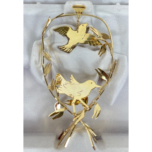 384 - Four boxed GEORGE JENSEN gold-plated Christmas decorations to include a golden goose and a donkey#44... 