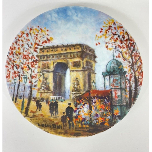 388 - Twelve limited edition LIMOGES collectors' plates with Parisian scenes to include L'Arc de Triomphe,... 