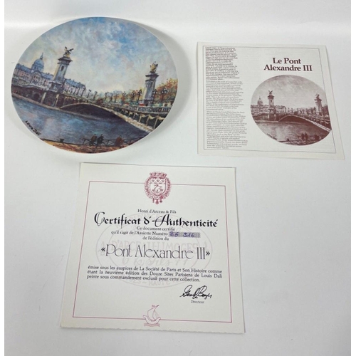 388 - Twelve limited edition LIMOGES collectors' plates with Parisian scenes to include L'Arc de Triomphe,... 