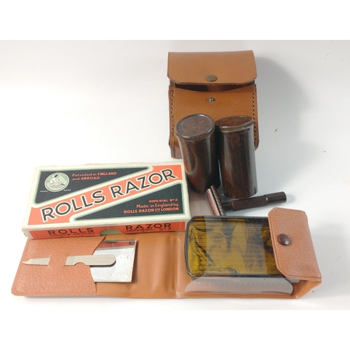 413 - A vintage ROLLS RAZOR Imperial No 2 in original box plus a travellers' shaving kit and a dressing ki... 