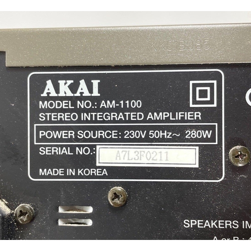 443 - WIRED FOR SOUND!A VINTAGE AKAI stereo integrated amplifier AM1100 with remote control, with also wit... 