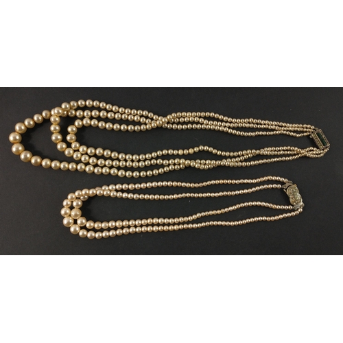 50B - VINTAGE Two sets of early 20th century strings of faux pearls, one is a triple strand with silver st... 