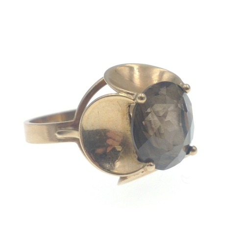 7 - A 375 stamped yellow gold ring with an oval dark stone weight 5.70g gross approx ring size MAndA SUB... 